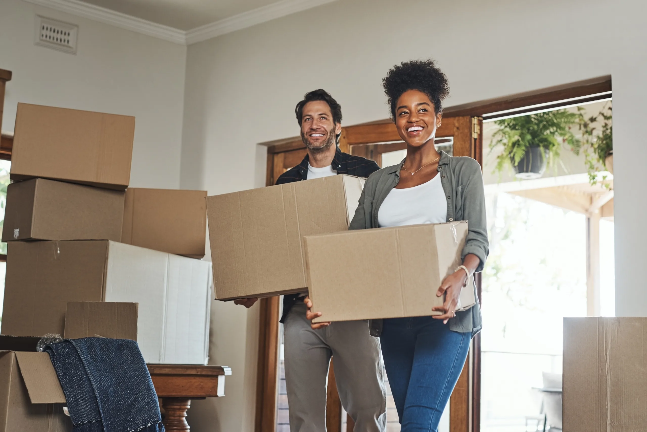 Happy,Couple,,Real,Estate,And,Moving,In,Property,With,Boxes